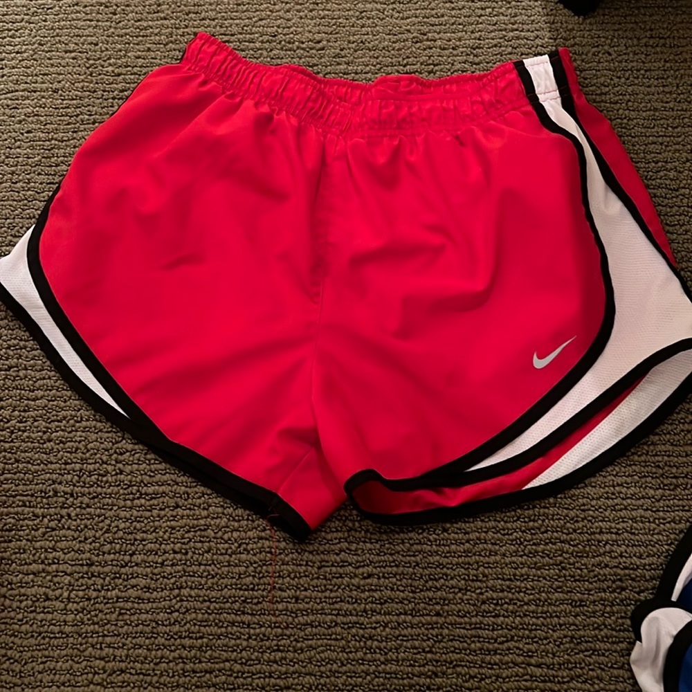 Nike red running shorts